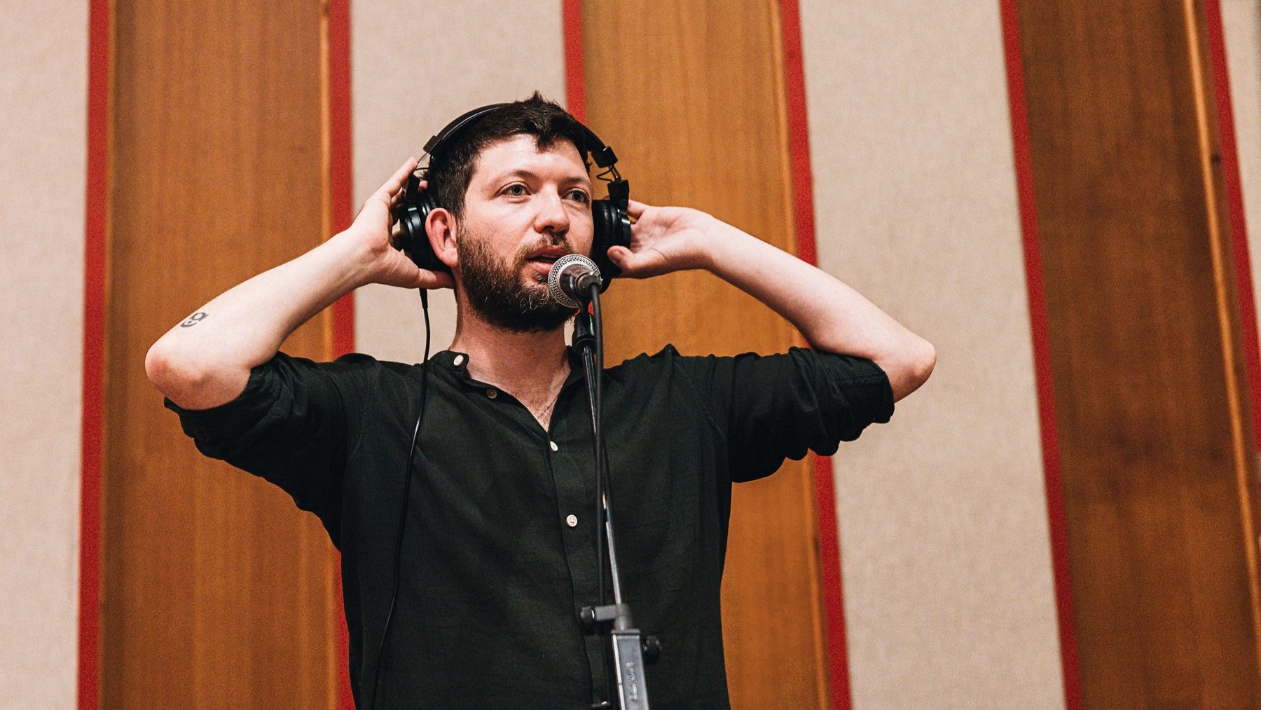 Gabriele di Franco with headphones in the studio, recording The Value of Choices
